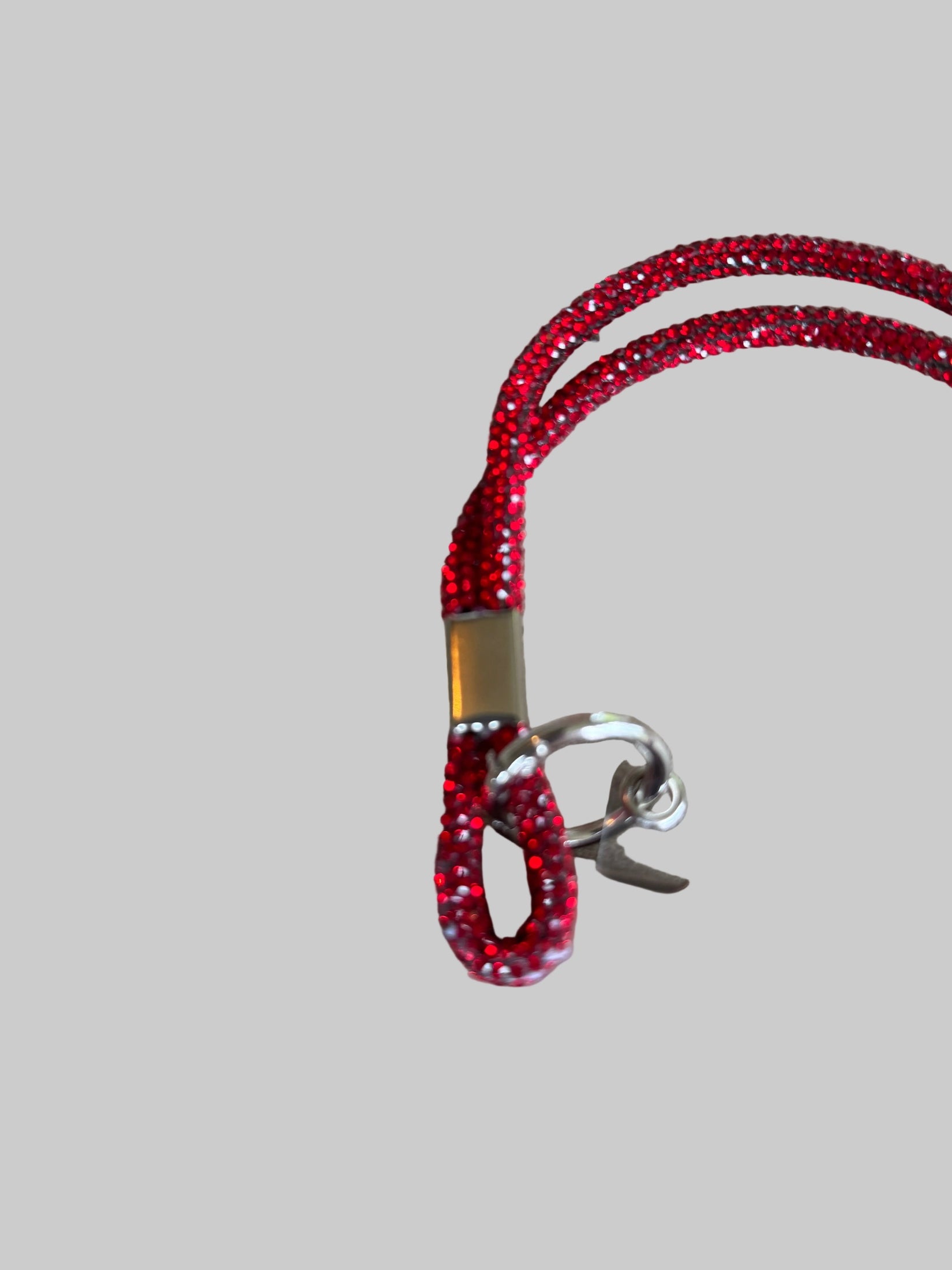 Red sparkly phone lanyard detail