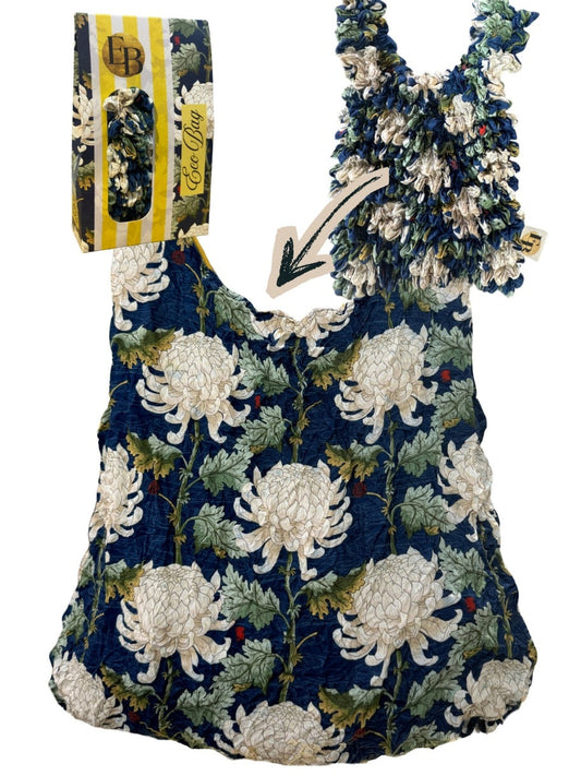 Be Bougie navy blue reusable tote bag with white chrysanthemum floral print and textured stretchy fabric