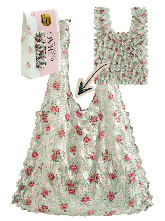 Be Bougie duck egg blue and rose floral print stretchy eco-friendly tote bag with its matching gift packaging.