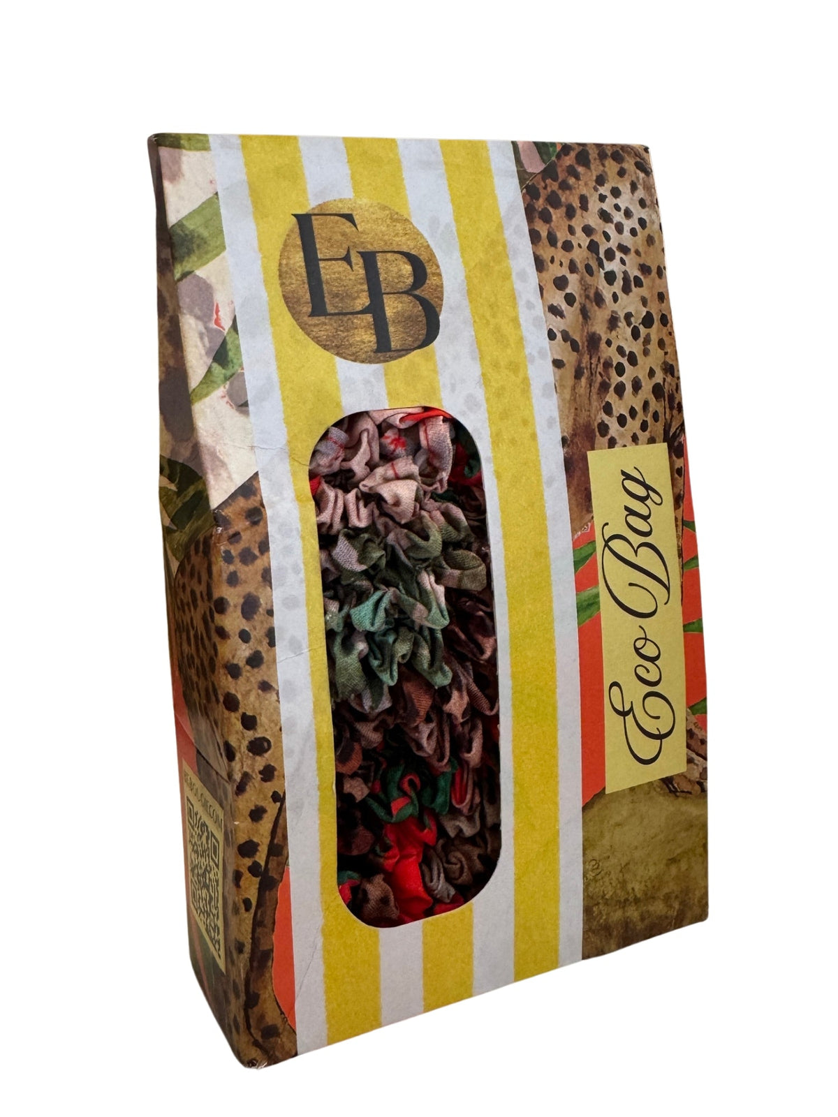 Be Bougie reusable eco-friendly tote bag in leopard and palm print packaging with a window showing textured fabric.