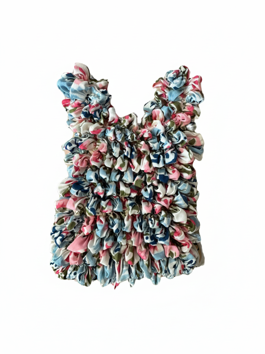 Be Bougie paisley print sustainable stretchy eco tote bag in blue, pink, and red, shown in compact pocket size.
