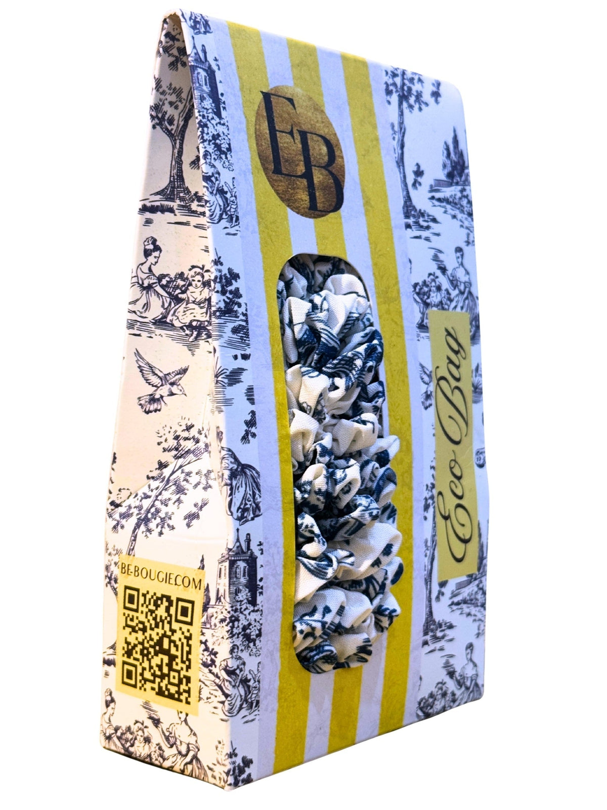 Be Bougie toile print sustainable eco tote bag folded in its yellow and white striped branded packaging box