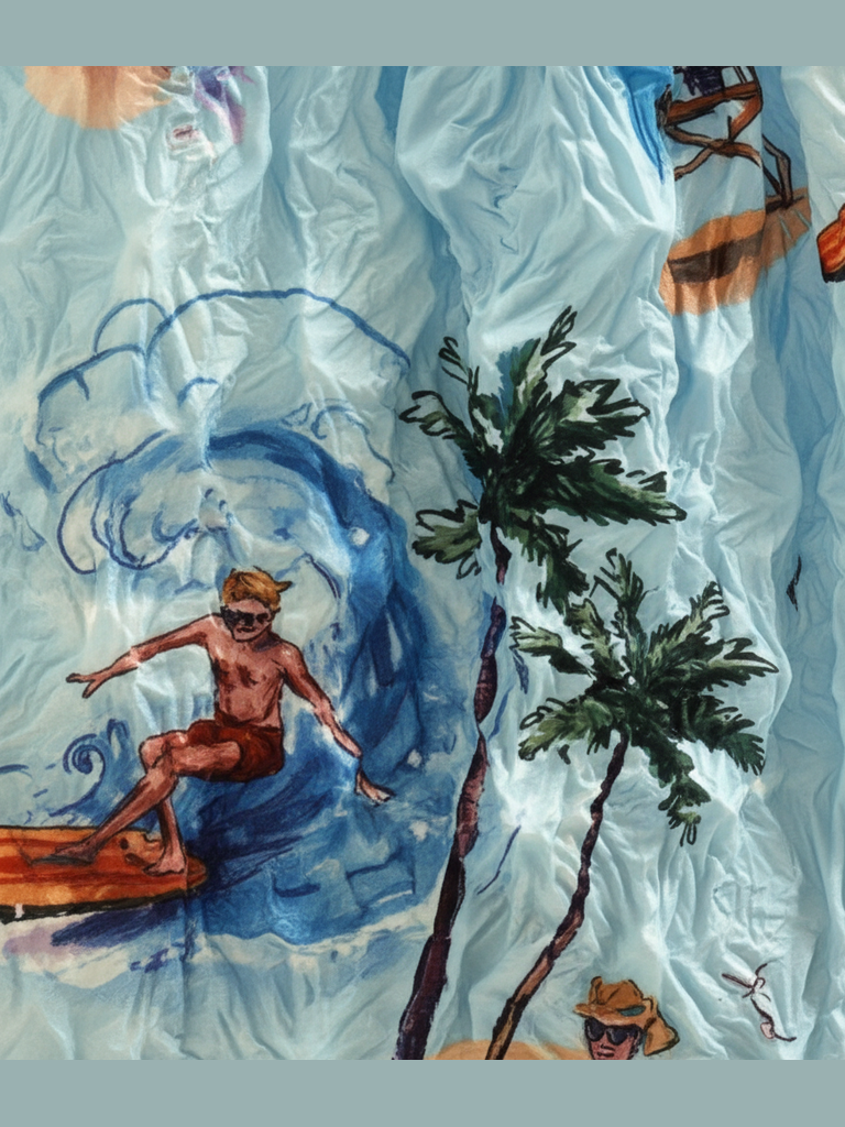 Be Bougie sustainable tote bag featuring a light blue fabric with a tropical surfing, palm tree, and ocean print.